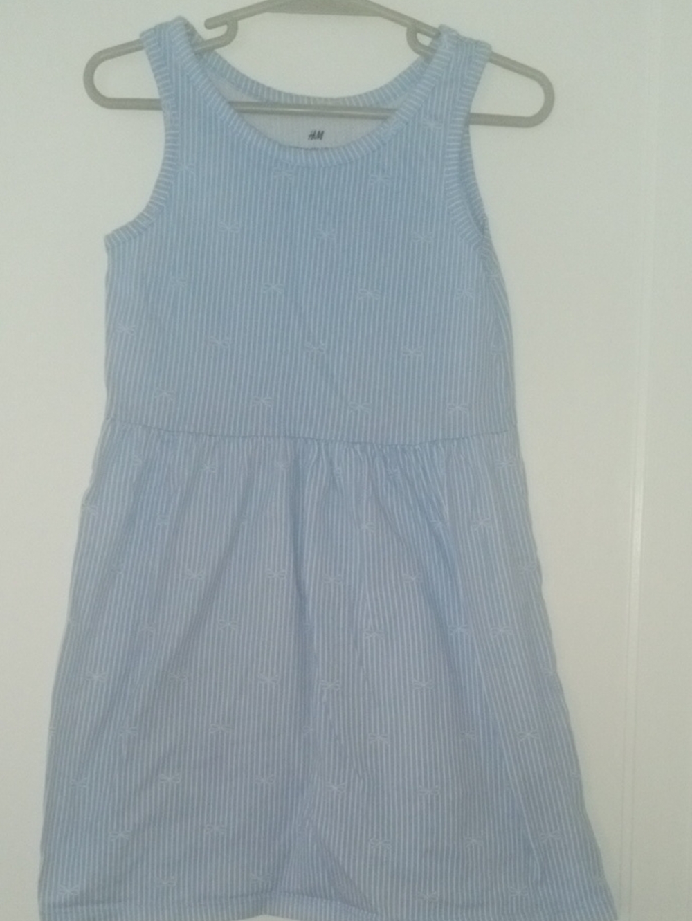 girl 5 H&M sundress blue white striped, with white bows